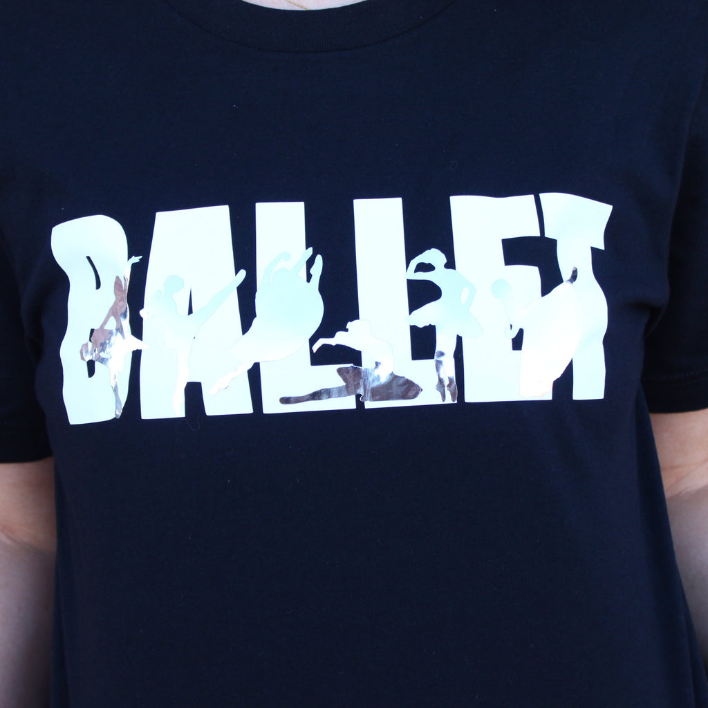 Ballet in white block letters on black t shirt with iconic ballet variations in silver silhouettes. La Esmeralda, Cupid and Kitri from Don Quixote, Dying Swan or Odette from Swan Lake, Raymonda, and Giselle Act 2.
