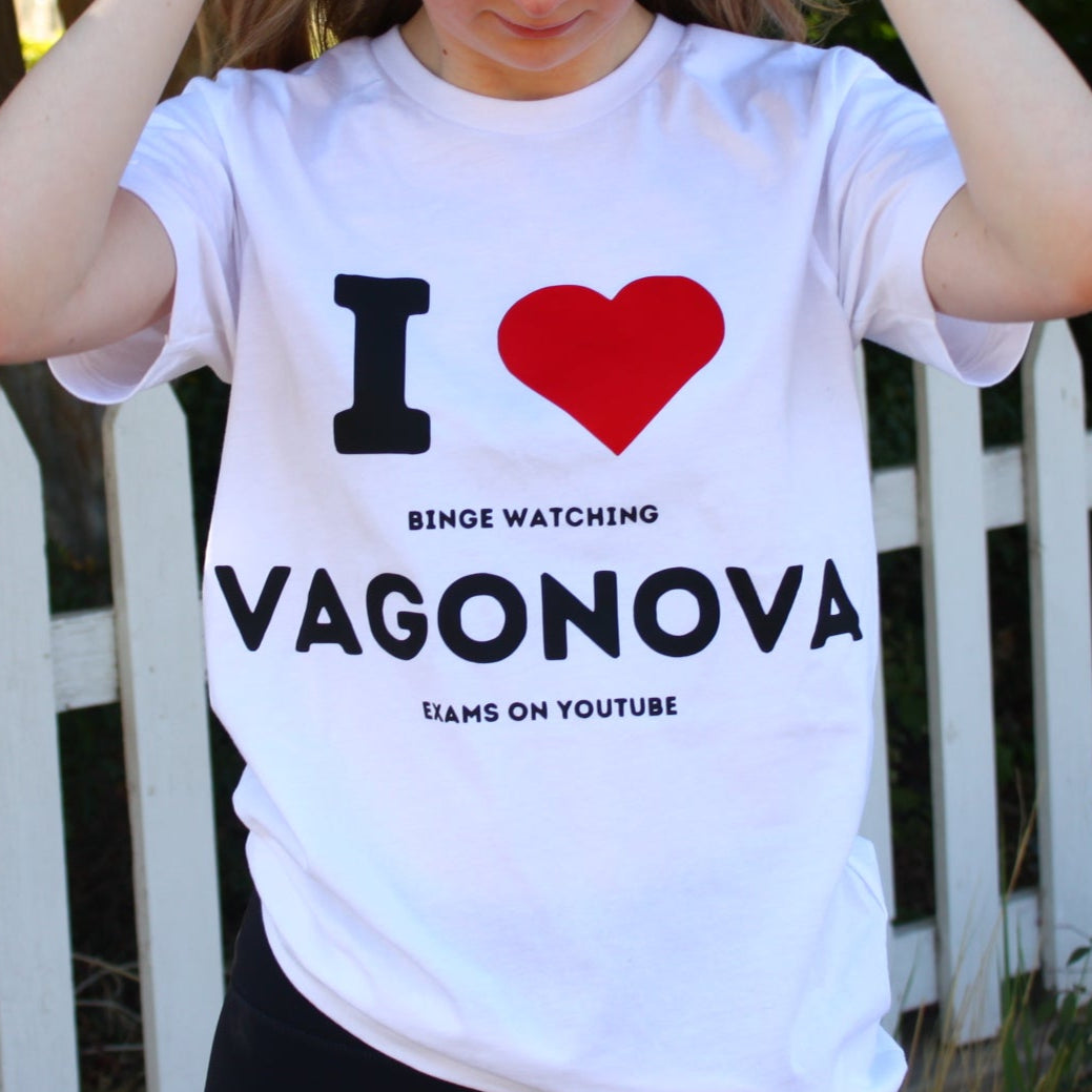  'I ❤️ VAGONOVA'. white T shirt.Small print reads "I heart binge watching Vagonova exams on youtube. for ballet dancers who like Agrippina Vagonova Academy method training